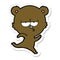 sticker of a running bear cartoon