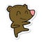 sticker of a smiling dancing bear cartoon