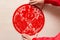 Sticking fluffy red flat paper-cut sticker as symbol of Chinese New Year of the pig the Chinese means good luck and lots of