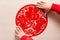 Sticking fluffy red flat paper-cut sticker as symbol of Chinese New Year of the pig the Chinese means good luck and the pig