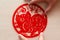 Sticking fluffy red flat paper-cut sticker as symbol of Chinese New Year of the pig the Chinese means the pig brings you safety