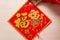 Sticking fluffy red sticker as symbol of Chinese New Year of the pig the Chinese means the pig brings you fortune and the