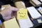 Sticky Note in Hand Businessman Desk Files Folder Working Make a Plan