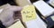 Sticky Note in Hand Businessman Desk Files Folder Working Make a Plan