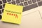 Sticky note with phrase Reset Password on laptop, top view