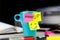 Sticky notes on a coffe cup at office desk. Wake up and smile. Begin your day with Positive thoughts