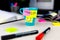 Sticky notes on a coffe cup at office desk. Wake up and smile. Begin your day with Positive thoughts