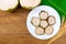 Sticky Rice Cake or Cake Nian Gao and ingredients on wooden background