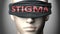 Stigma can make things harder to see or makes us blind to the reality - pictured as word Stigma on a blindfold to symbolize denial