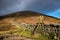 Stile over the Mourne Wall at Hare`s Gap, Mourne Mountains, County Down, Northern Ireland.