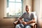 Still finding reasons to smile. Cropped portrait of a happy senior man sitting in an armchair in his nursing home during