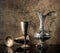 Still life with Ancient jug for wine and silver goblets