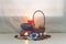 Still life aroma set and Egg in rattan basket