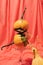 Still life arrangement of cristal glasses filled with small pumpkins.