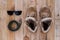 Still life art photography concept with boots, belt and sunglass