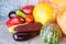 Still life of autumn vegetables: melon and watermelon, corn, eggplant, peppers, tomatoes