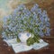 Still life with beautiful Forget-me-not bouquet in ceramic vase. Blue spring flowers `forget me not` Myosotis in