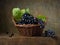 Still life with black grapes