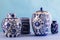 Still life with blue and white ceramic pots and ginger jars with differential focus - space for text