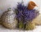 Still-life with a bouquet of lavender basket and bottle