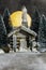 Still life cabin in snowy woods with full moon