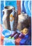 Still life with ceramic jugs and eggplants on blue