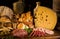 Still life with cheese, italian salami, different types of bread, olives, etc.