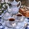 Still life with cups of tea and home cake