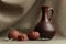 Still life of dried tangerines and leaves with a clay brown jug