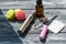 Still life with e-cig and juice on the wooden background.