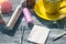 Still life with e-cig and juice on the wooden background.