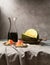 Still life with fresh melon, jamon and red wine on the table