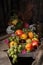 Still life with fruit and antique female bust in retro style