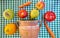 Still life of fruits and vegetables located on a table with green checkered tablecloth. Autumnal still life. Rustic design