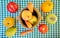 Still life of fruits and vegetables located on a table with green checkered tablecloth. Autumnal still life. Rustic design