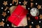 still life with  ginger cookies shaped like stars and letters merry Christmas , hand made red gift box and  red mug with