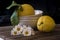 Still life with glass, lemons and bowls