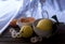 Still life with glass, lemons and tangerine