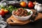 Still life with healthy buckwheat cooked with vegetables in a white bowl on a dark background, a dish of Azerbaijani cuisine,