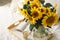 Still life in home interior of living room. Sunflowers, Coffee and open book. Read, Rest