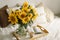 Still life in home interior of living room. Sunflowers, Coffee and open book. Read, Rest