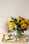 Still life in home interior of living room. Sunflowers, Coffee and open book. Read, Rest