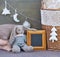 Still life with interior Christmas decoration elements and rabbit toy