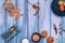 Still life with iridescent metal forks, himalayan salt, colored pasta,