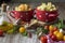 Still life Italian pasta. Tortellini in the form of hearts on a cutting board with olive tree