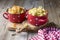 Still life Italian pasta. Tortellini in the form of hearts on a cutting board with olive tree