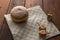 Still life for jewish holiday Hanukkah with donut and 3 dreidels on wooden rustic table