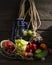 Still life with kerosene lamp and vegetable harvest in cellar.