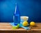 Still life with lemons and blue bottle