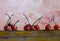 Still life oil painting. A lot of red cherries scattered on the table, abstract background